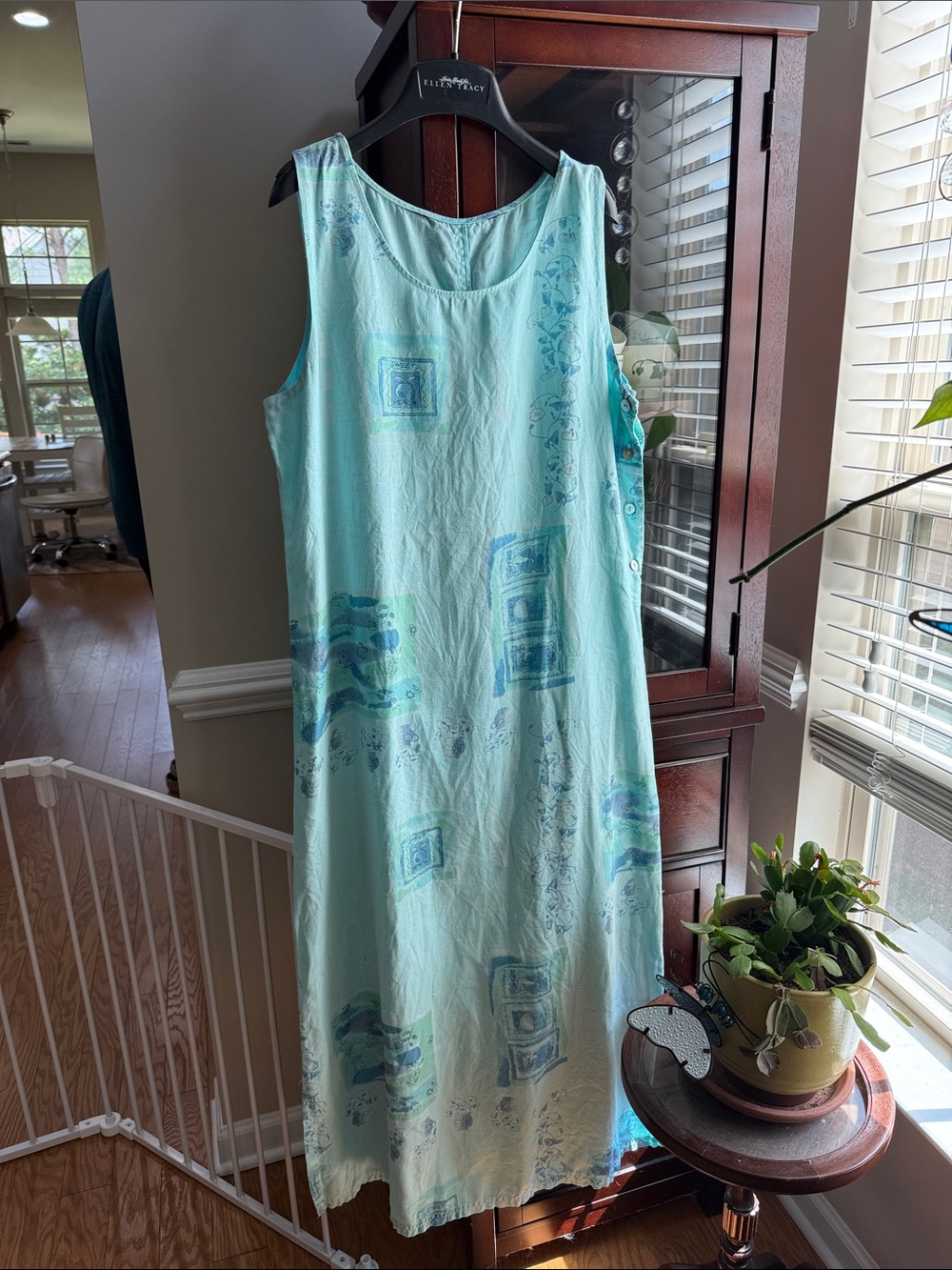 Light Aqua Sleeveless Maxi Dress with Subtle Blue Print